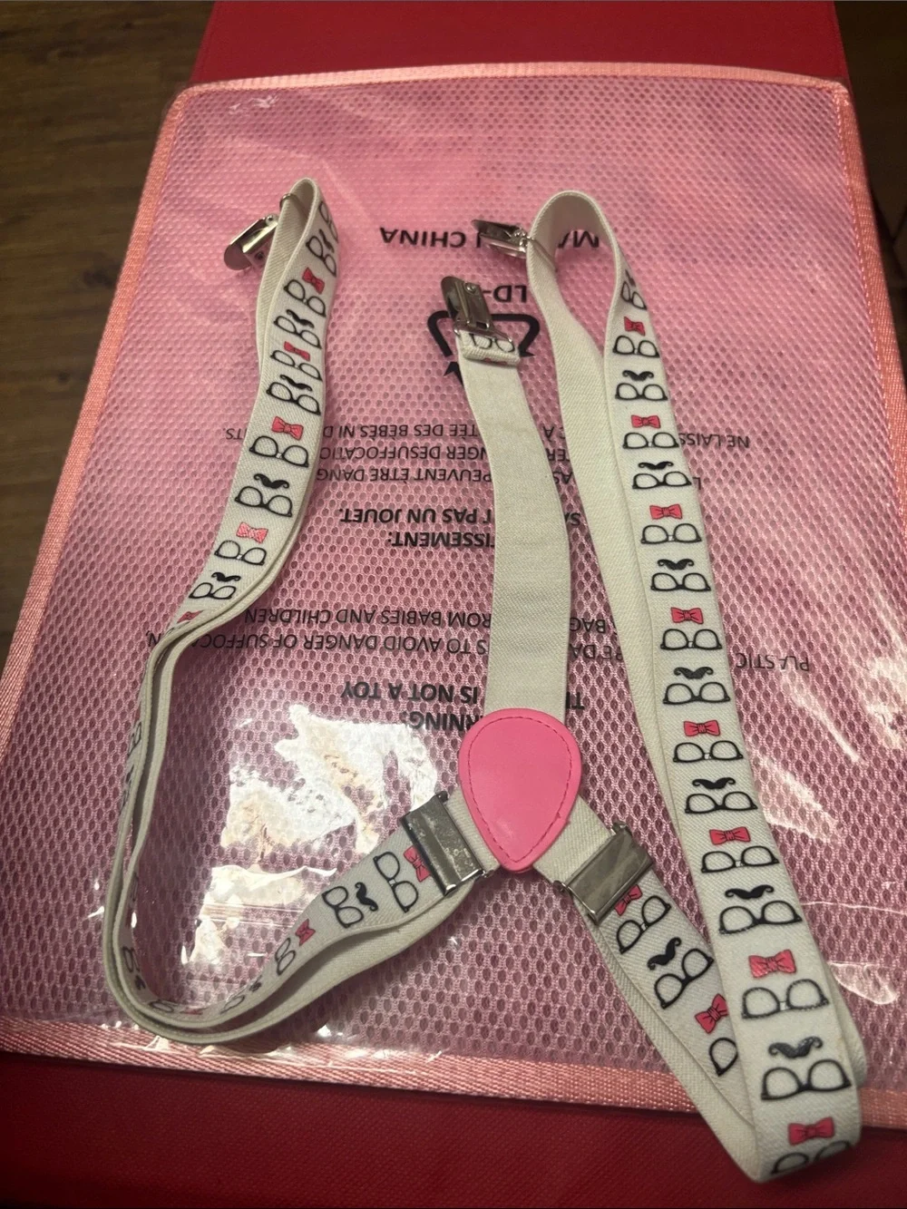 White Novelty Suspenders with Pink glasses ,bow tie and mustache Accent